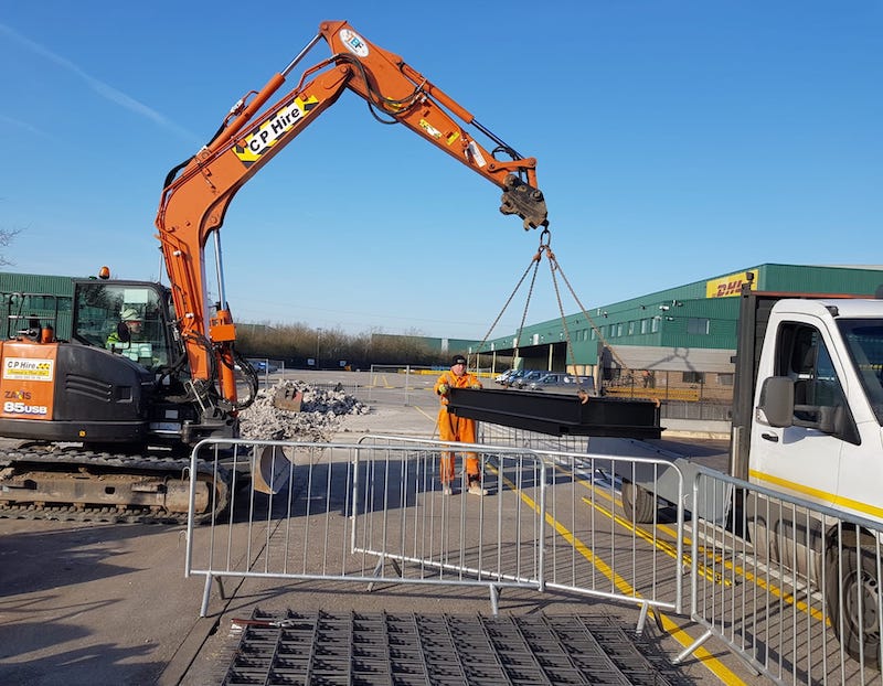 Wellingborough Couriers Flat Bed Courier Van Being Unloaded